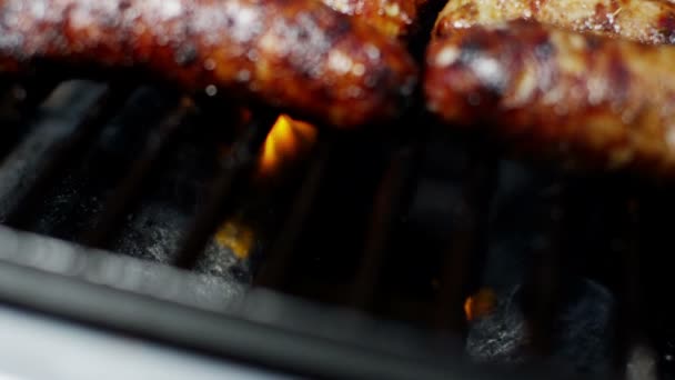 Sausages grilling chargrilled barbecue — Stock Video