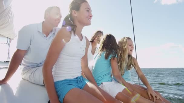Young girls with parents  having fun on luxury yacht — Stock video