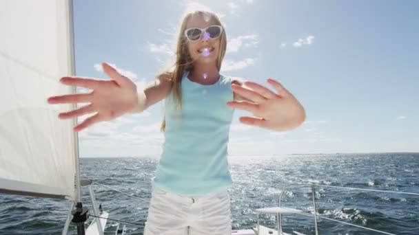 Young girl on luxury yacht in the ocean — Stock Video