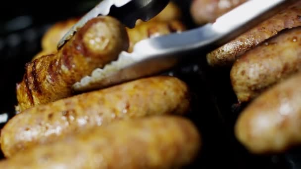 Grilled meat sausages on BBQ — Stock Video