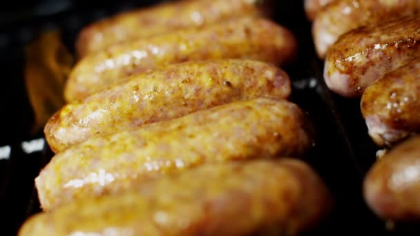 Sausages grilling chargrilled barbecue — Stock Video