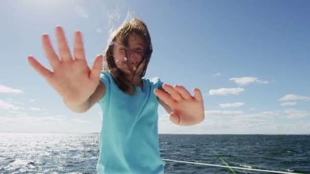 Young girl on luxury yacht in the ocean — Stock Video