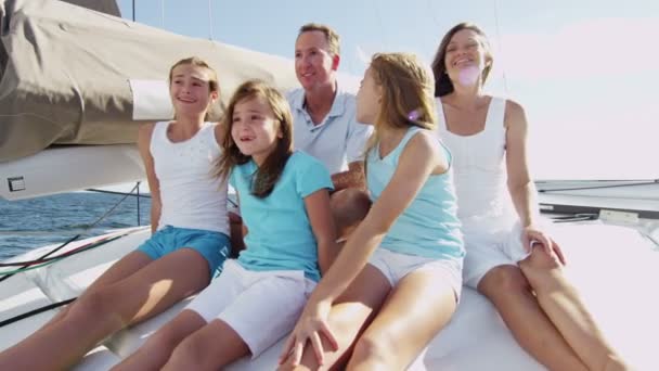 Young girls with parents  having fun on luxury yacht — Stok video