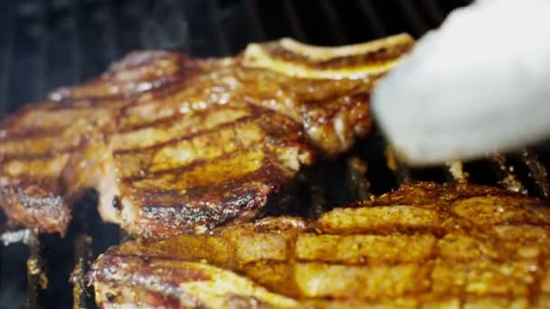 Beef Steaks on grill at steakhouse — Stock Video