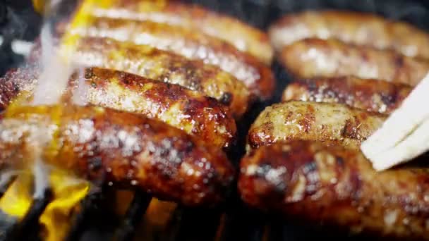 Sausages grilling chargrilled barbecue — Stock Video