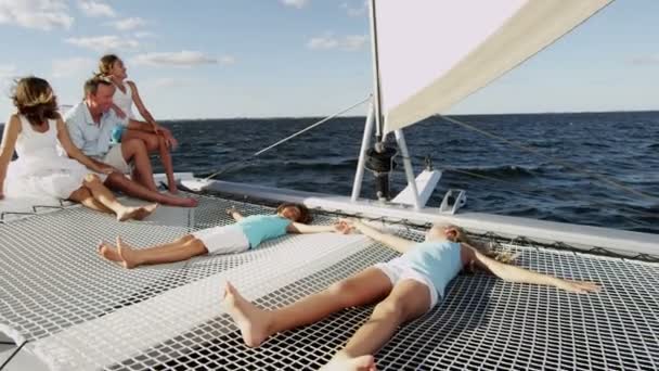 Family with children sailing on luxury yacht — Stock Video