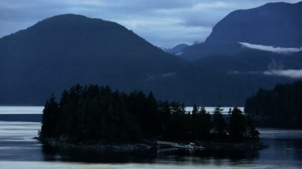 Coastal mountains and lake panorama at sunset — Stock Video