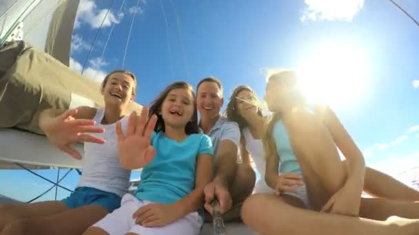 Parents with daughters having fun on yacht — Stock Video