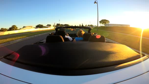 Couple driving in luxury cabriolet car — Stock Video