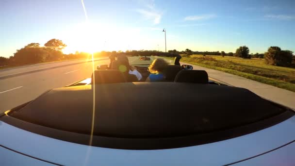 Couple driving in luxury cabriolet car — Stock Video