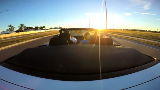 Couple driving in luxury cabriolet car — Stock Video