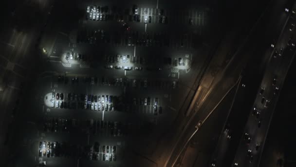 Havadan aydınlatmalı gece manzarası Şehir Binaları — Stok video