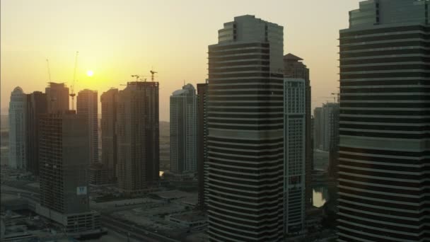 Aerial Dubai City Skyscrapers at sunset — Stockvideo
