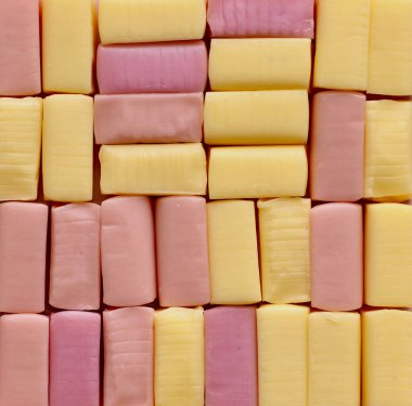 Sarı ve pembe kare şekilli şeker arkaplanı