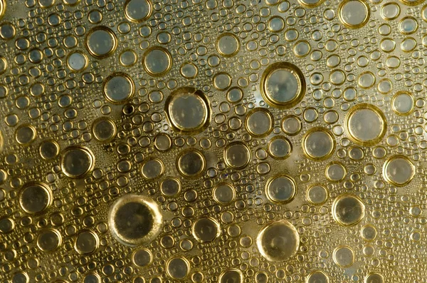 Gotas líquidas em uma janela — Fotografia de Stock