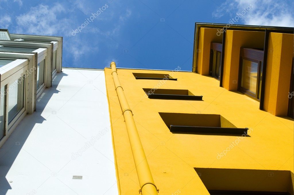 Colored buildings against the blue sky