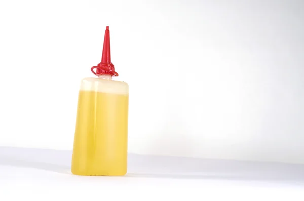 Frasco de plástico com líquido — Fotografia de Stock