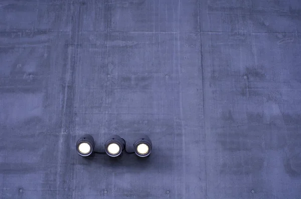 Concrete surface with lamps — 图库照片