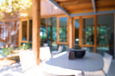 Bulanık kahve ve müşterilerin arka plan vintage ton renk tarzına sahip dinlendirici kafe.