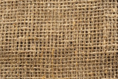 Kumaş. Çuval bezi kumaşının dokusu çok yakın. Paketleme malzemesi. Burlap Hessian Sacking 'in Arkaplanı