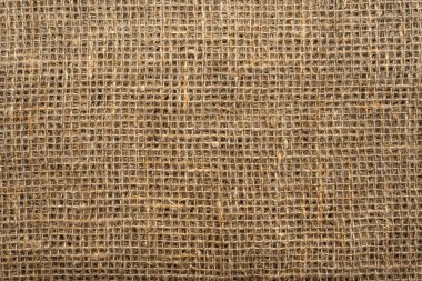 Kumaş. Çuval bezi kumaşının dokusu çok yakın. Paketleme malzemesi. Burlap Hessian Sacking 'in Arkaplanı