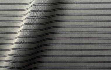 Kumaş. Çizgili kumaştan yapılmış kusursuz bir arka plan. Kıyafet. Terzilik ve moda tasarımı için malzeme