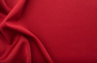 Kumaş. Buruşuk kumaş. Arka plan saten ya da ipek kumaştan yapılmıştır. Elbise dikmek için malzeme ve moda tasarımcısı, tasarımcı ve terzi işi..