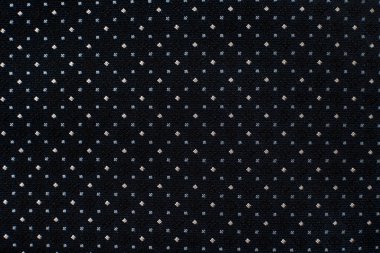 Kumaşın arka planında küçük bir desen var. Terzi, terzi ve elbise dikmek için moda tasarımcısı malzemesi. Doku. Desen