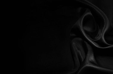 Sanat eserlerinin arka planı ve dekorasyonu için kumaşın koyu kumaş dokusunun bir parçası, güzel buruşmuş ipek ya da keten deseni. Buruşuk bir kumaş parçası.