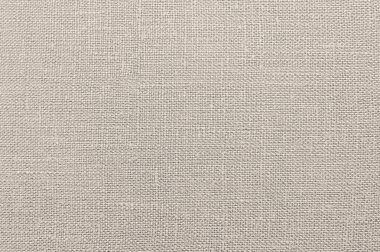 Beyaz çuval bezi kumaş, arka plan beyaz gri renk. Maddenin dokusu hafiftir. Çuval bezi.