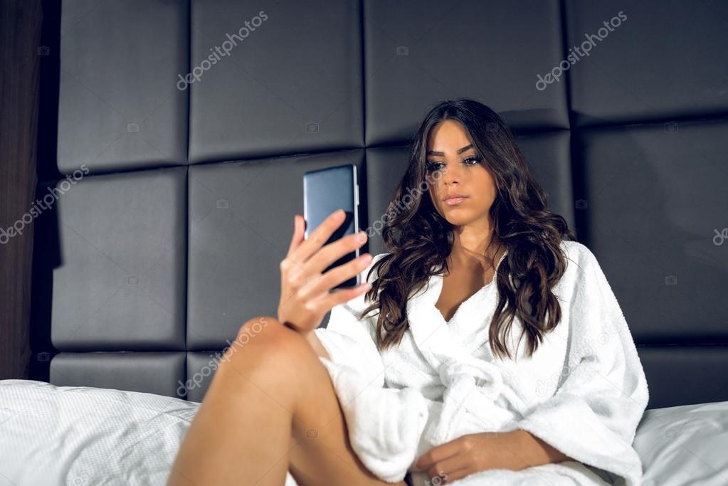 Texting in bathrobe