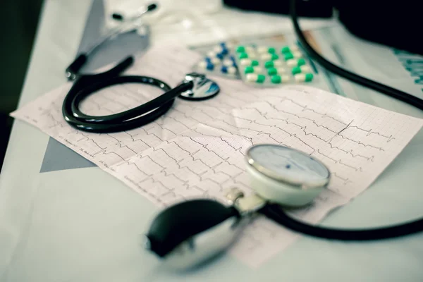 Stethoscope, pills and ECG — Stock Photo, Image