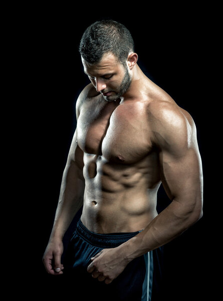 Man posing in gym