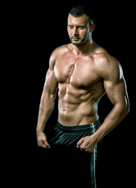 Man posing in gym — Stock Photo, Image
