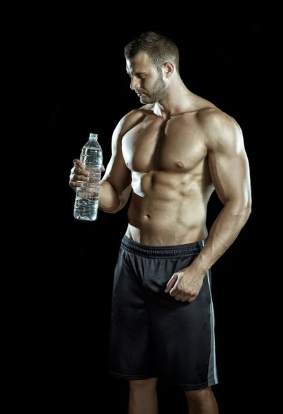 Drinking water in gym — Stock Photo, Image