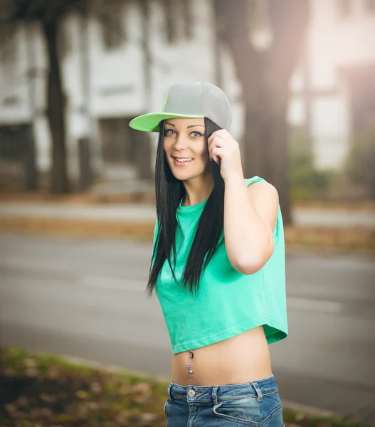 Young girl posing with navel piercing — Stock Photo, Image