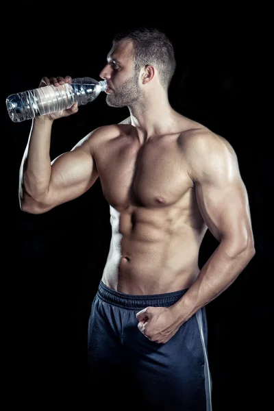 Drinking water in gym — Stock Photo, Image