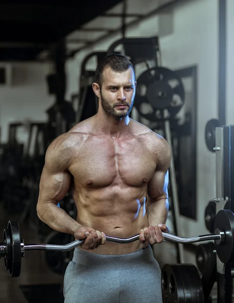 Man doing weight lifting — Stock Photo, Image