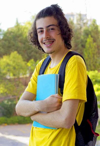 portrait of a handsome young man back to school