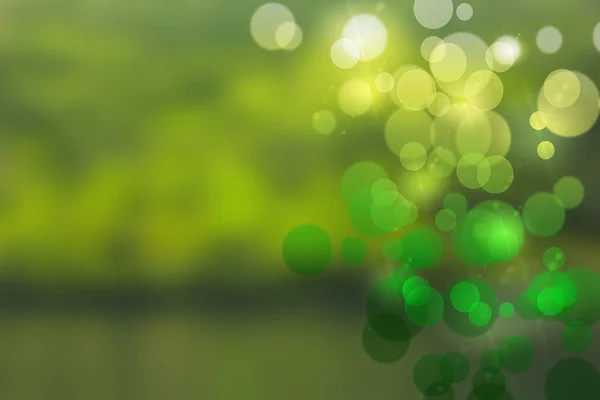 緑の背景に緑のボケと光が — ストック写真