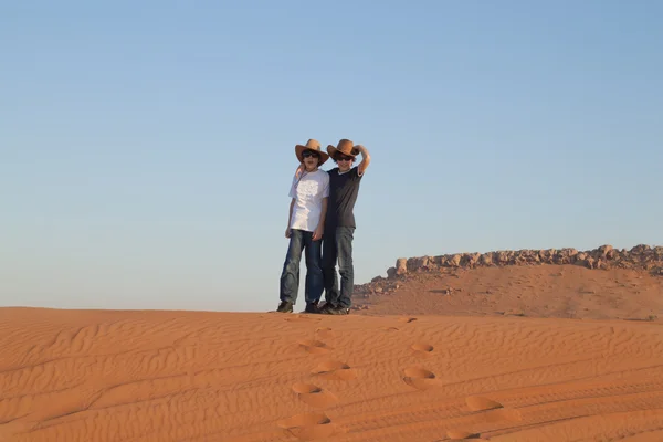 Happy boys in a desert — Stock Photo, Image