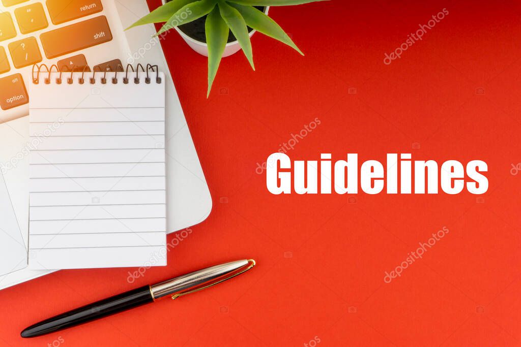 GUIDELINES text with notepad, laptop, fountain pen and decorative plant on red background. Business and Copy Space Concept