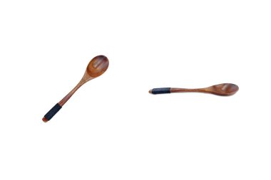 Tahta yemek kaşığı beyaz arka planda izole edilmiş. Çatal bıçak takımı ve sofra takımı.