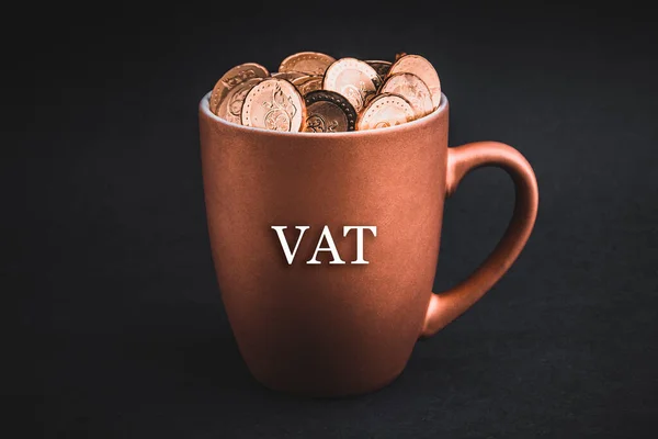 Vat Text Coins Cups Black Background Tax Savings Profit Investment Image En Vente