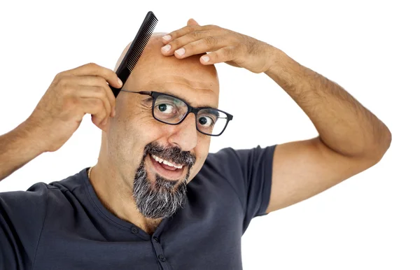 A hairless man with comb — Stock Photo, Image