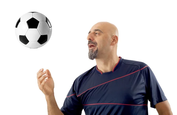 Smiling soccer holding a football on isolated — Stock Photo, Image