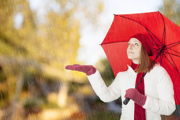 Young woman with red umbrella — Stock Photo, Image