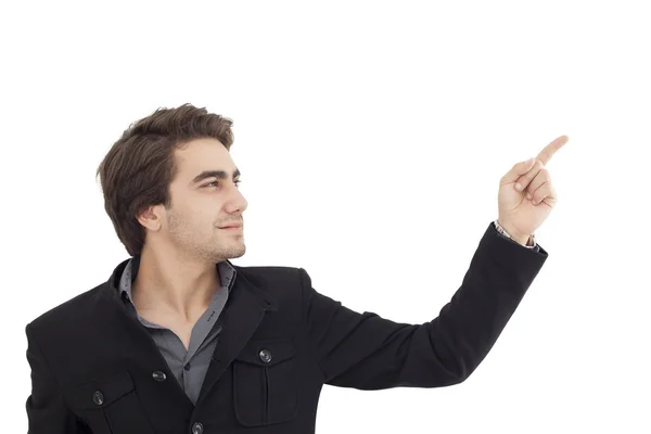 Joven guapo apuntando a algún lugar —  Fotos de Stock