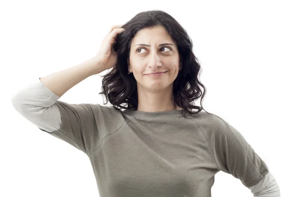 Young woman scratching her head — Stock Photo, Image