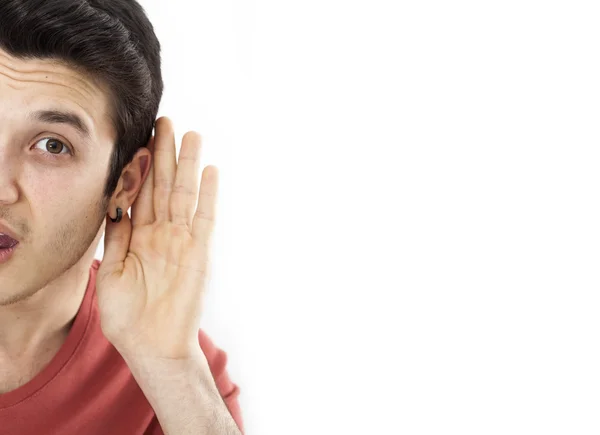 Curious young man listens — Stock Photo, Image